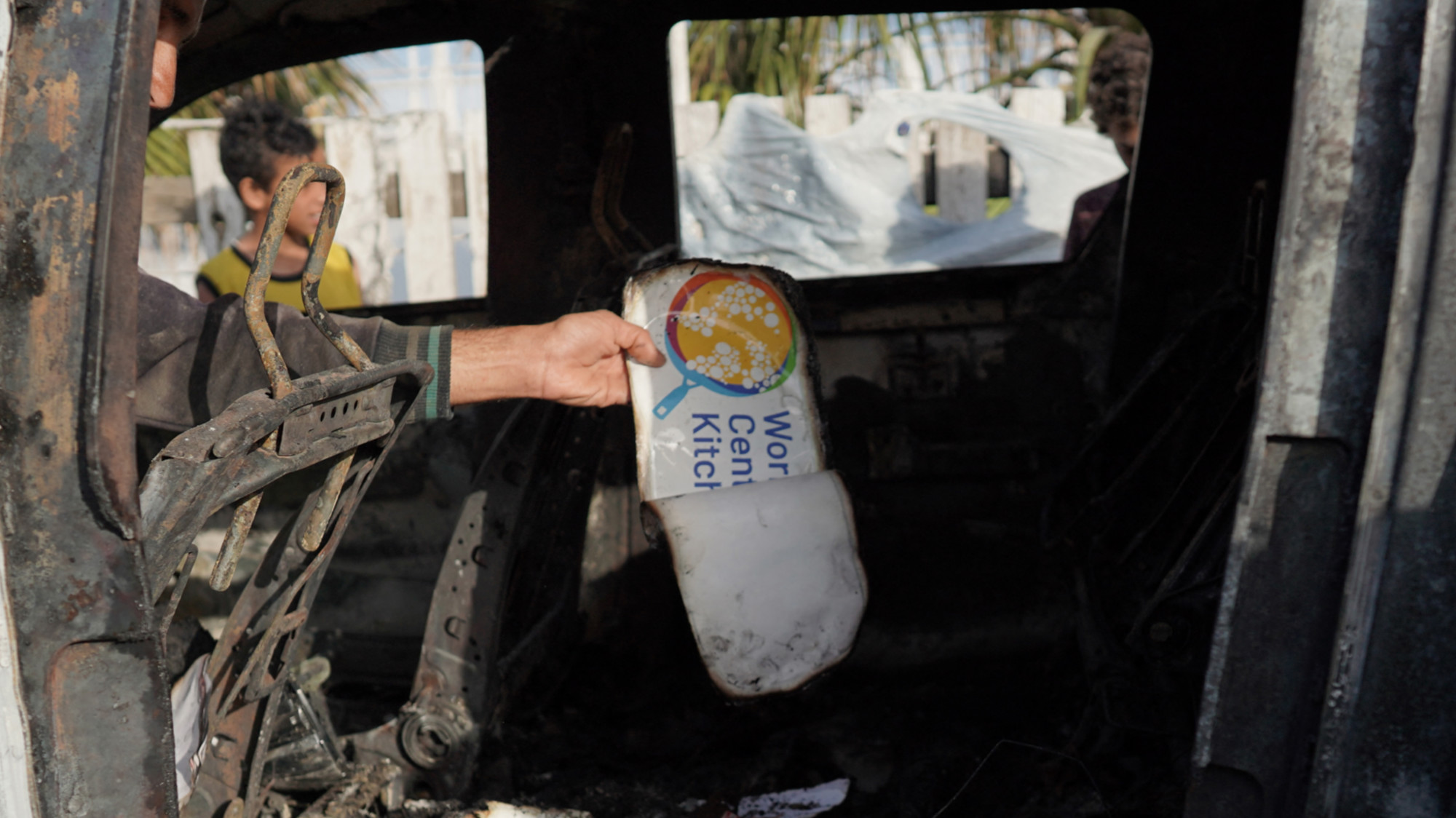 The aftermath of an Israeli strike on a World Central Kitchen aid convoy in Deir al-Balah in the central Gaza Strip on 2 April, 2024 (AFP)